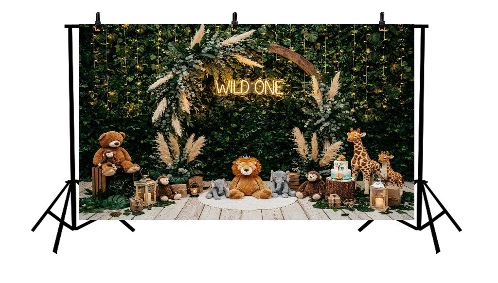 WILD ONE SAFARI GREENERY WALL WITH PLUSH ANIMALS AND CAKE - PRINTED BACKDROP