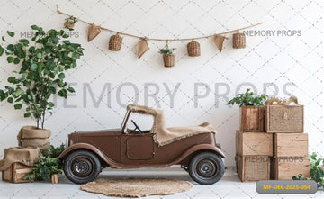 VINTAGE BROWN PEDAL CAR WITH RUSTIC WOODEN BOXES AND GREENERY - PRINTED BACKDROP