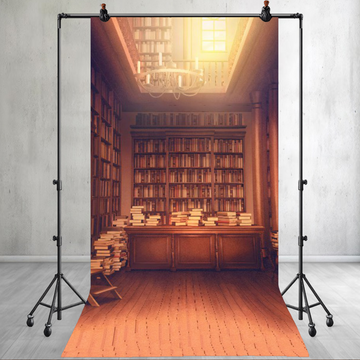 BOOKS ARE STACKED ON A TABLE IN A LIBRARY WITH A LAMP - PRINTED BACKDROPS